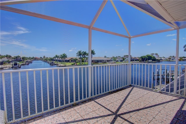 view of patio with a water view