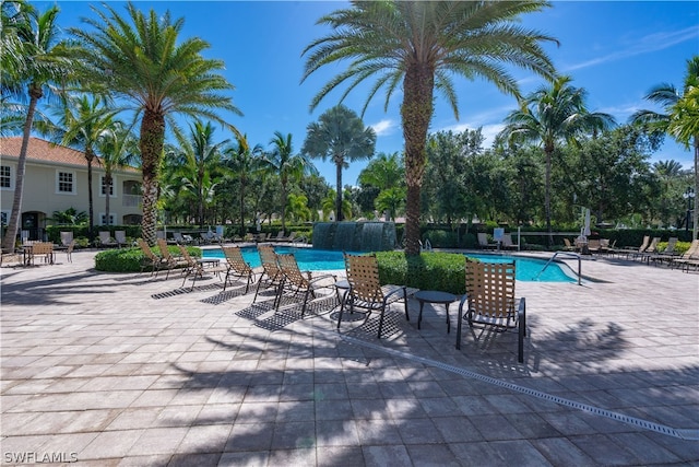 view of swimming pool featuring a patio