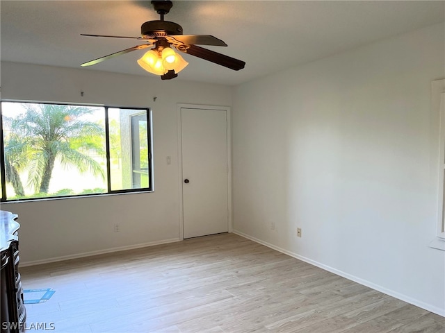 interior space featuring ceiling fan and light wood-type flooring