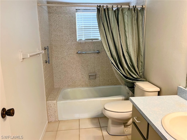 full bathroom with vanity, toilet, tile patterned floors, and shower / bath combo