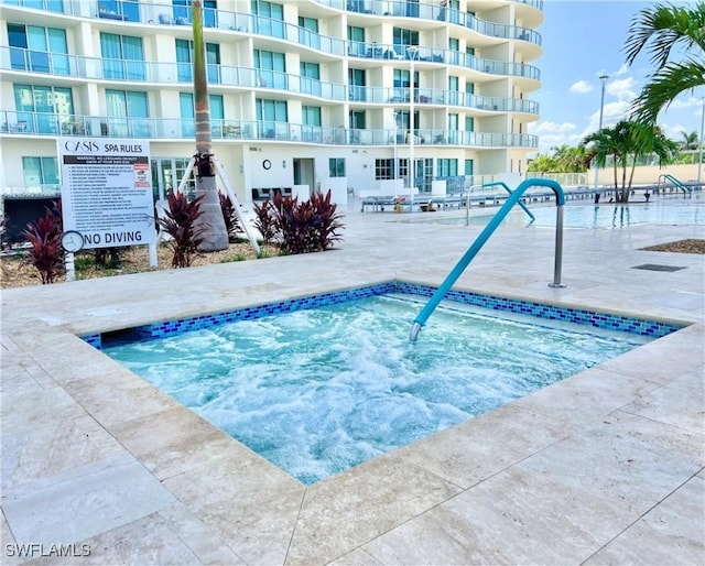 3000 Oasis Grand Blvd Unit 1606, Fort Myers, FL 33916 - view of pool with a community hot tub