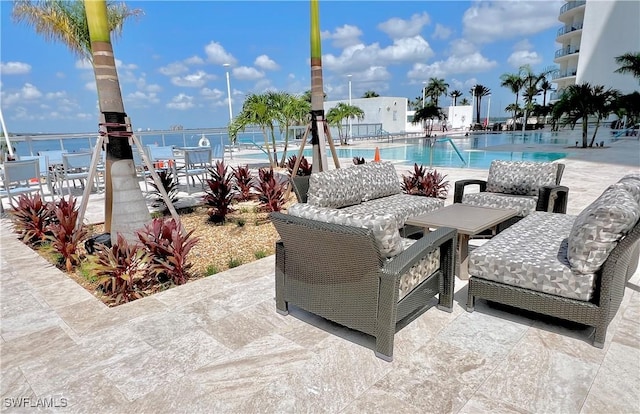 3000 Oasis Grand Blvd Unit 1606, Fort Myers, FL 33916 - view of patio with a community pool