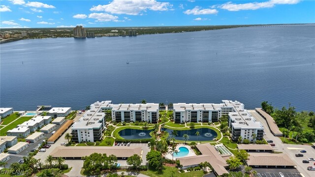 birds eye view of property featuring a water view