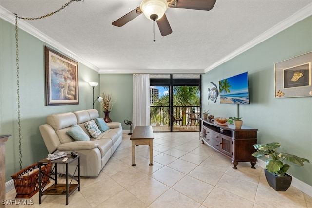 living room featuring crown molding, a textured ceiling, ceiling fan, and light tile patterned floors