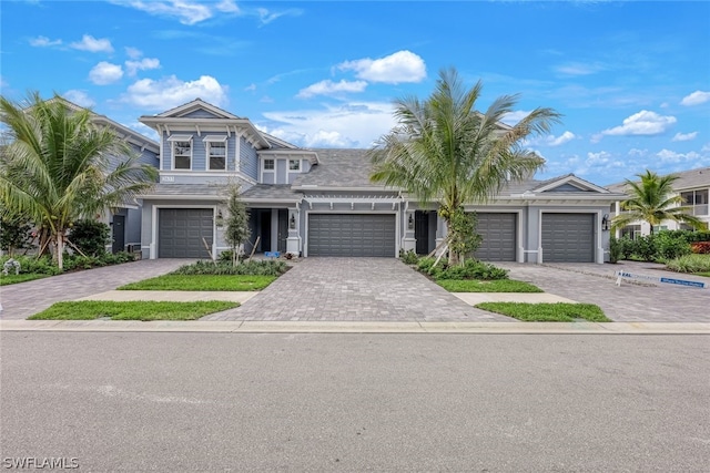 view of front facade featuring decorative driveway