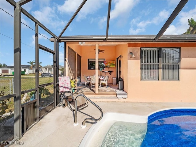 exterior space featuring ceiling fan