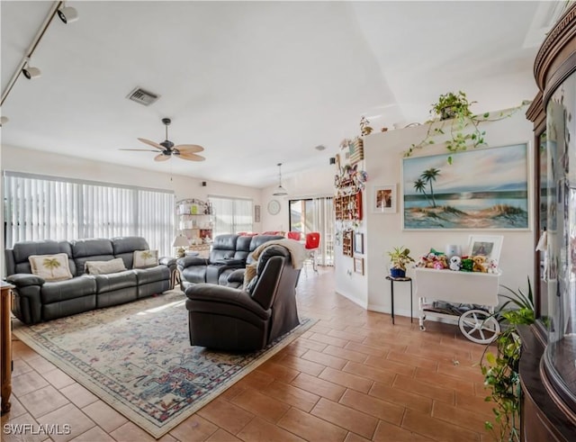 living room featuring ceiling fan and track lighting