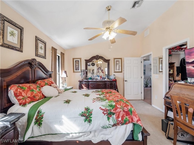 bedroom with ceiling fan and light carpet