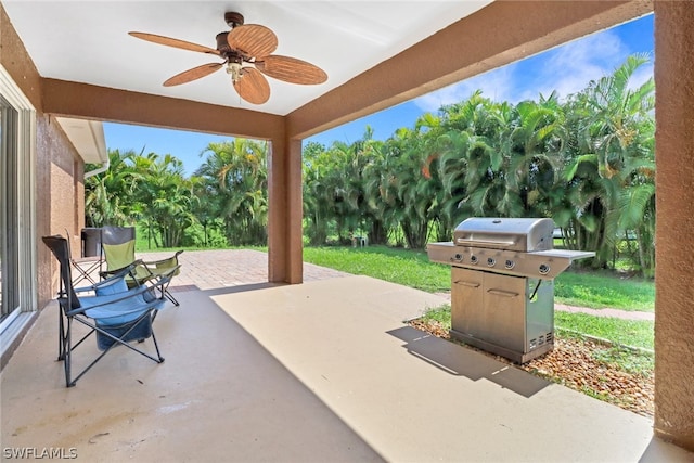 view of patio / terrace featuring area for grilling and ceiling fan