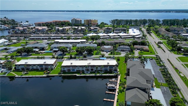 bird's eye view with a water view