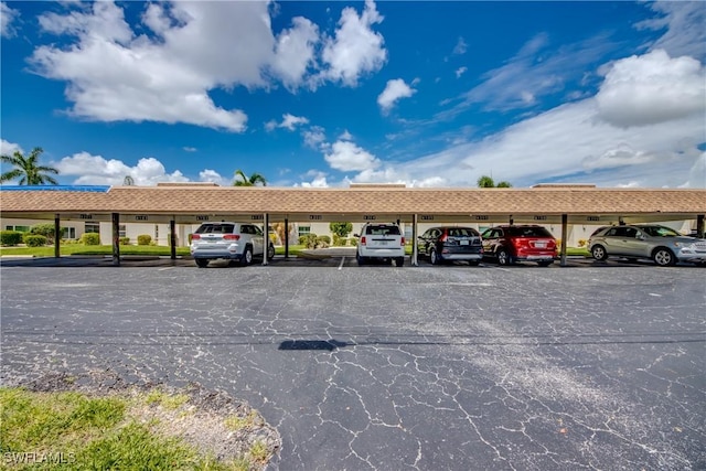 view of car parking with a carport