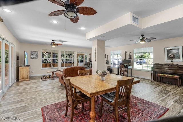 15700 Bahama Way, Bokeelia, FL 33922 - dining room with ceiling fan, baseboards, light wood-style floors, and recessed lighting
