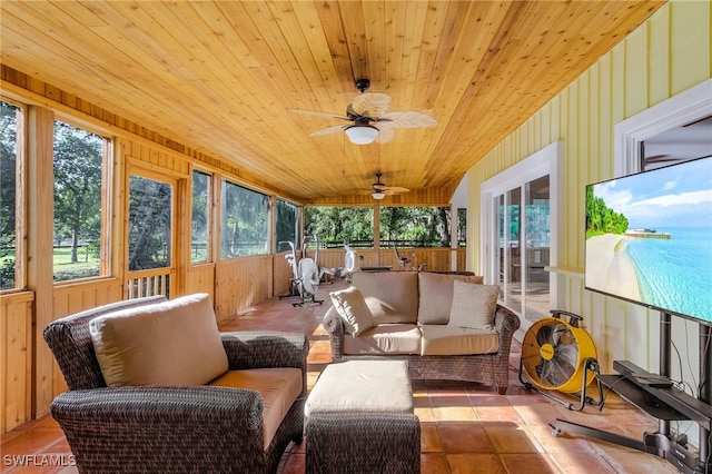 15700 Bahama Way, Bokeelia, FL 33922 - sunroom / solarium with outdoor lounge area, wooden ceiling, wooden walls, ceiling fan, and french doors