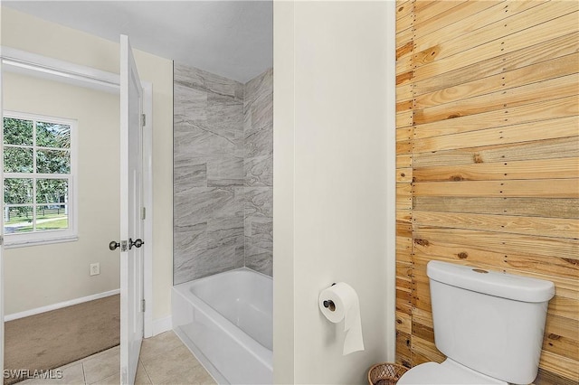 15700 Bahama Way, Bokeelia, FL 33922 - full bath with tile patterned floors, baseboards, toilet, and shower / bathtub combination