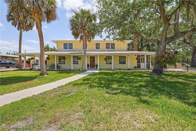 15700 Bahama Way, Bokeelia, FL 33922 - view of front of home featuring a porch and board and batten siding
