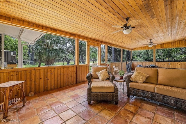 15700 Bahama Way, Bokeelia, FL 33922 - sunroom featuring a ceiling fan, outdoor lounge area, plenty of natural light, and lofted ceiling