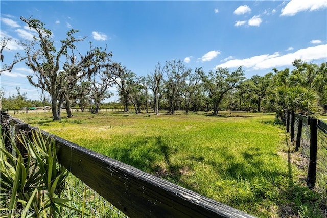 15700 Bahama Way, Bokeelia, FL 33922 - view of yard with fence and a view of rural / pastoral area