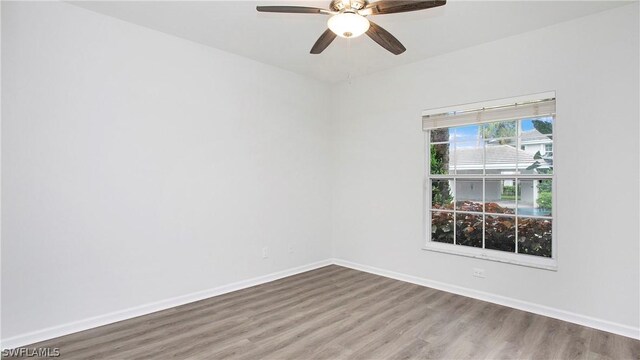 unfurnished room featuring wood-type flooring and ceiling fan