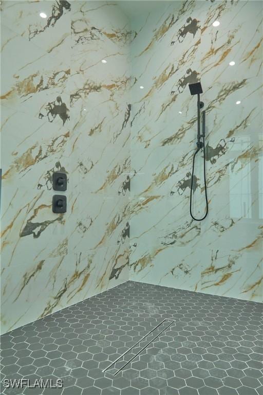 details with a marble finish shower