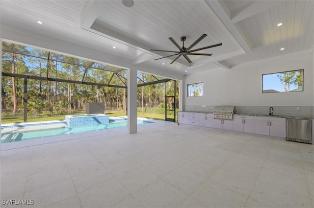 view of swimming pool featuring area for grilling, ceiling fan, and sink