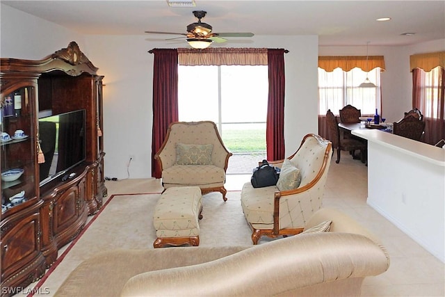 living room featuring ceiling fan