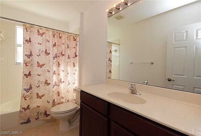 full bathroom with shower / tub combo with curtain, vanity, toilet, and tile patterned flooring