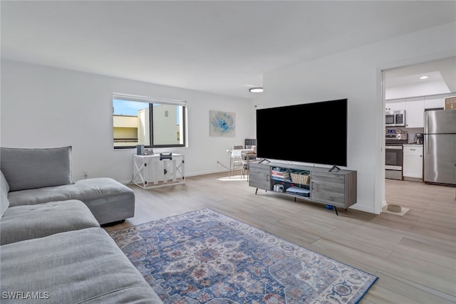 living room featuring light wood-type flooring