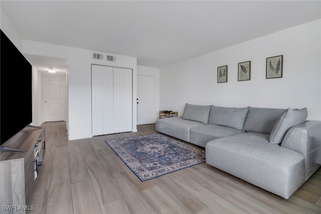 living room featuring light hardwood / wood-style floors