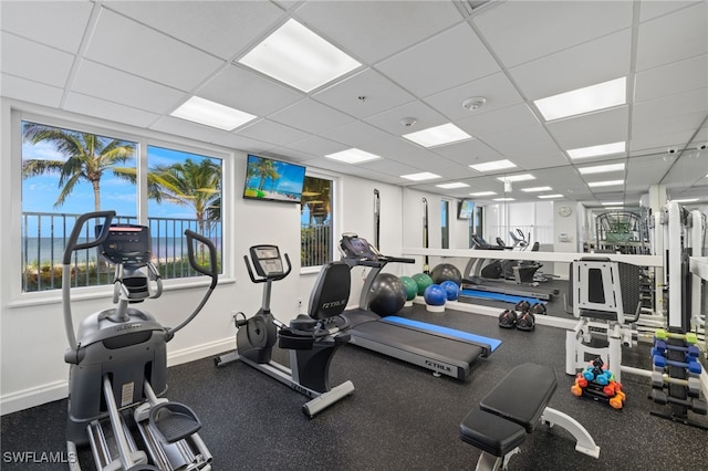 workout area with a drop ceiling