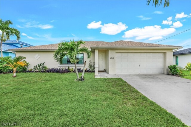 single story home with a garage and a front yard