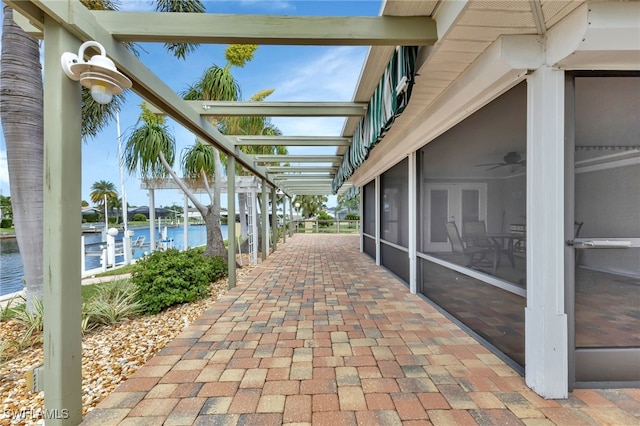 view of patio featuring a water view