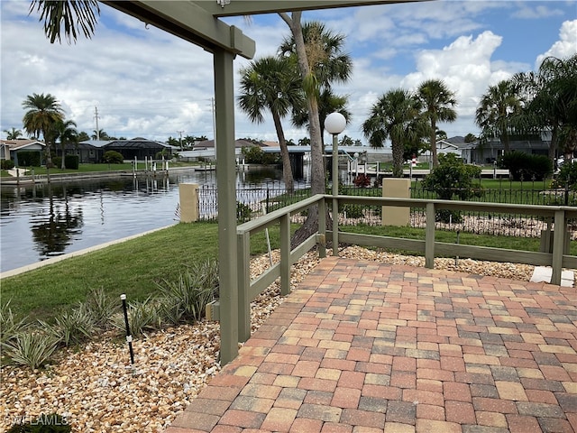 view of patio / terrace featuring a water view