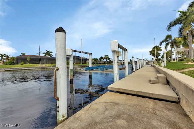 dock area with a water view