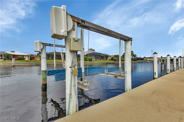 dock area with a water view