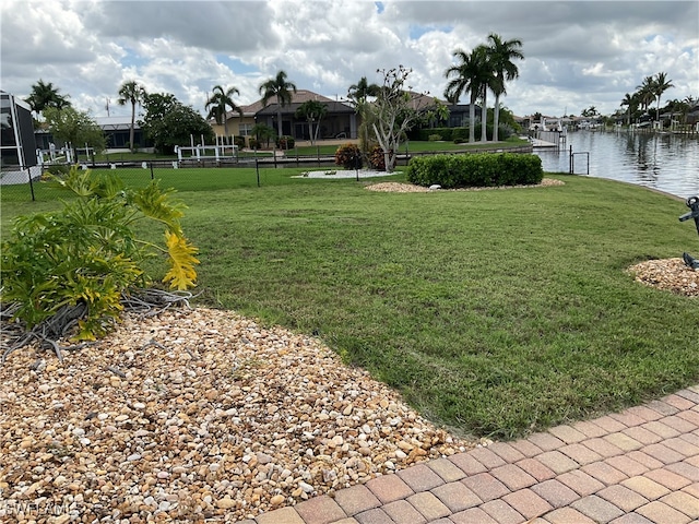 view of yard with a water view