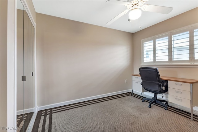 office area with ceiling fan and light colored carpet