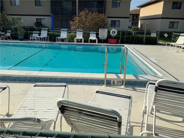 view of swimming pool featuring a patio