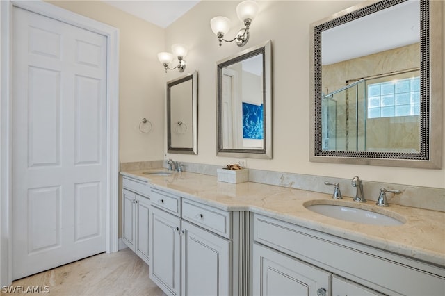 bathroom with vanity and an enclosed shower