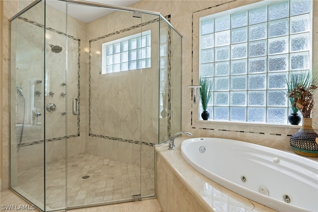 bathroom with independent shower and bath