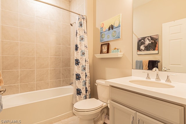 full bathroom with shower / tub combo with curtain, vanity, and toilet