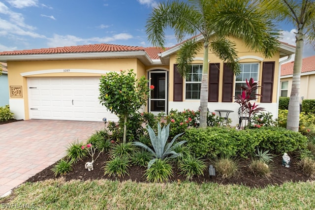 mediterranean / spanish-style house featuring a garage