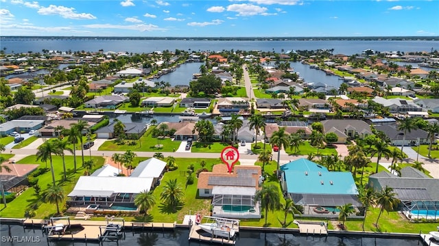 drone / aerial view featuring a water view