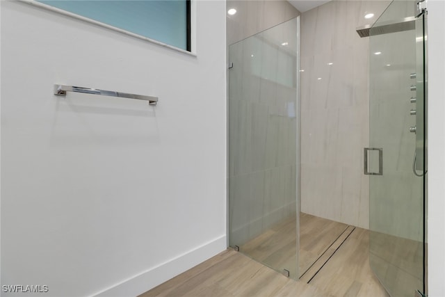 bathroom featuring an enclosed shower