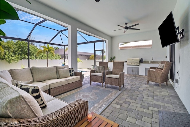 sunroom / solarium with ceiling fan