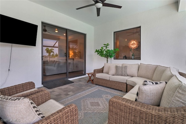 living room featuring ceiling fan