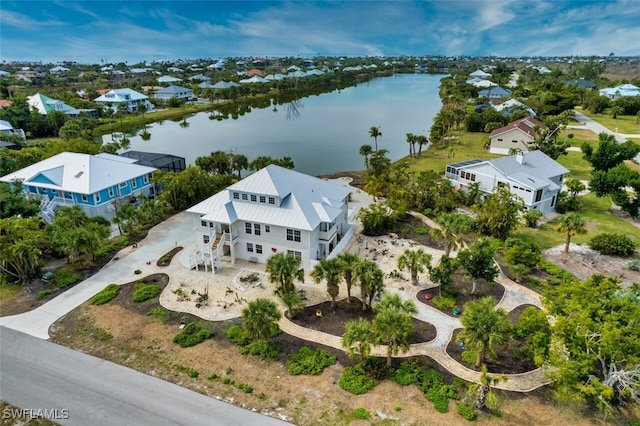 drone / aerial view with a water view