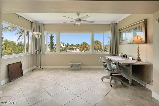 tiled home office with crown molding and ceiling fan