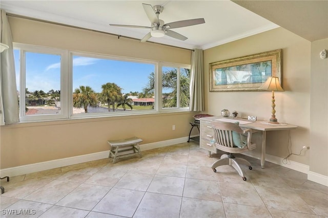 tiled office space featuring crown molding and ceiling fan