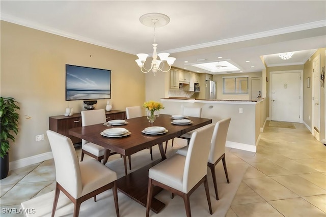 dining room with crown molding, light tile patterned flooring, and a chandelier