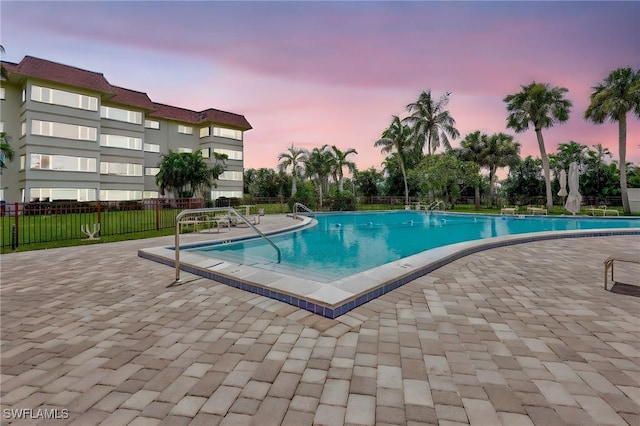 4309 Mariner Way Unit 304, Fort Myers, FL 33919 - community pool with a patio and fence